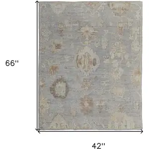 Photo of Gray and Blue Wool Floral Hand Knotted Area Rug