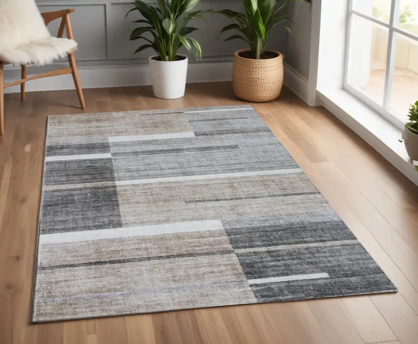 Gray and Brown Abstract Area Rug Photo 1