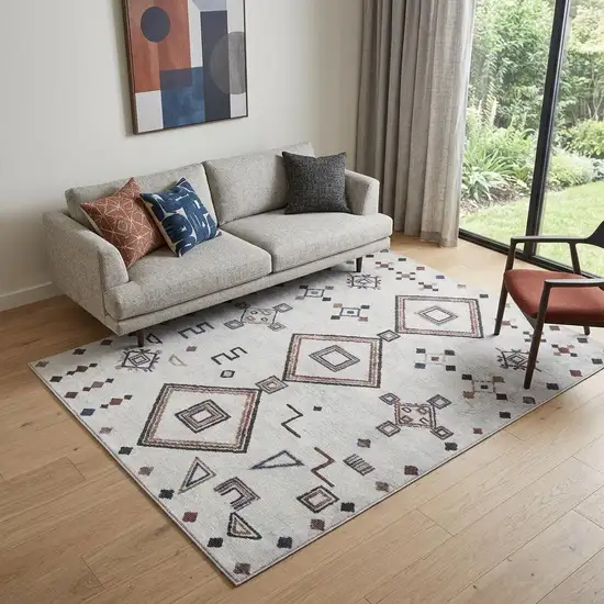 5' X 7' Gray and Brown Geometric Power Loom Washable Area Rug Photo 1