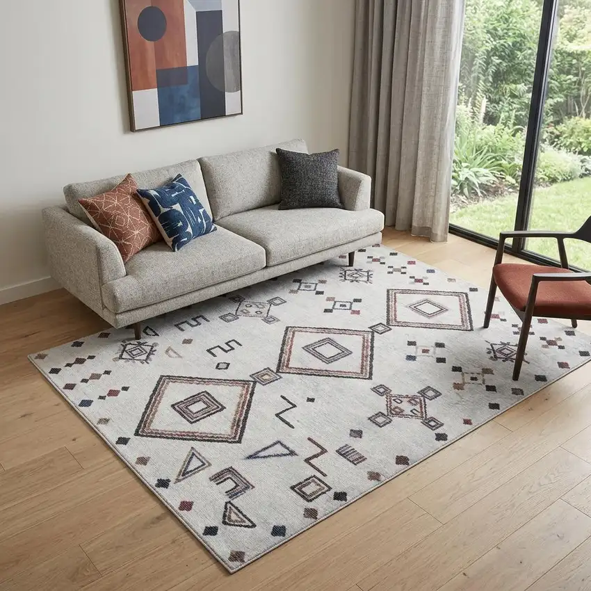 5' X 7' Gray and Brown Geometric Power Loom Washable Area Rug Photo 1