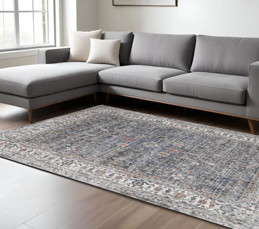 Ivory Charcoal and Orange Oriental Power Loom Area Rug Photo 1