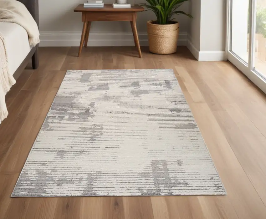 Gray and Cream Abstract Distressed Area Rug Photo 2