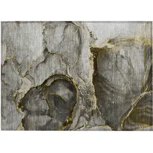Photo of Gray and Gold Abstract Washable Non Skid Indoor Outdoor Area Rug