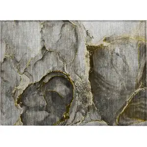 Photo of Gray and Gold Abstract Washable Non Skid Indoor Outdoor Area Rug