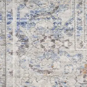 Photo of Gray and Gold Oriental Power Loom Distressed Area Rug With Fringe