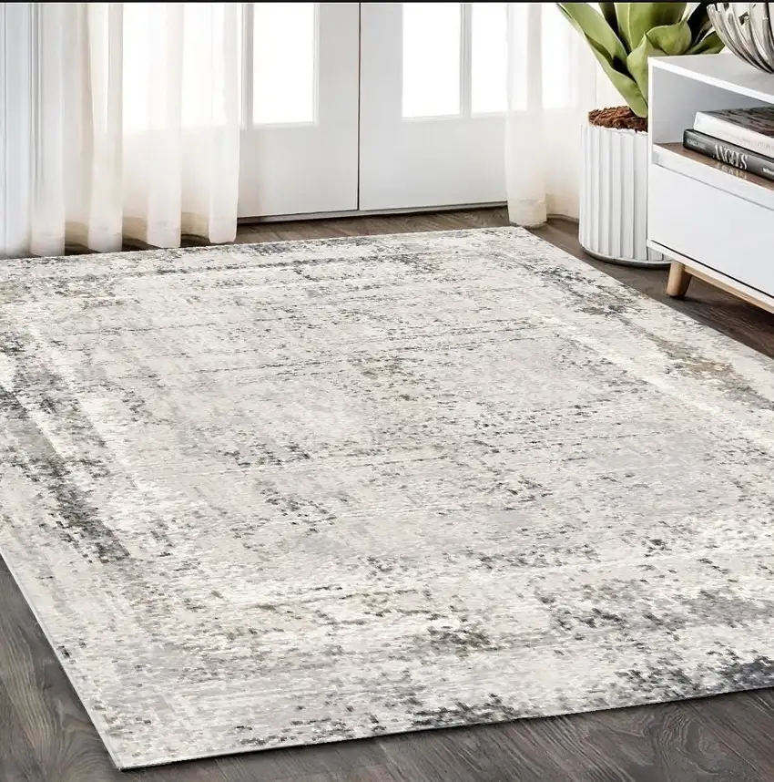 Gray and Ivory Abstract Power Loom Area Rug Photo 1