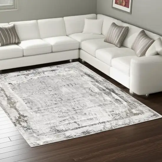 Gray and Ivory Abstract Power Loom Area Rug Photo 1