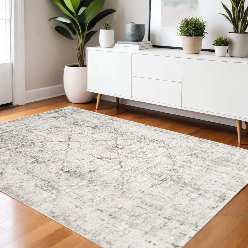 Gray and Ivory Abstract Power Loom Area Rug Photo 1