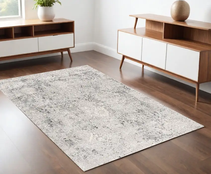 Gray and Ivory Abstract Power Loom Area Rug Photo 1