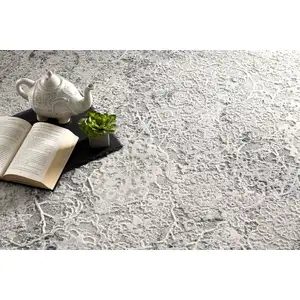 Photo of Gray and Ivory Abstract Distressed Area Rug