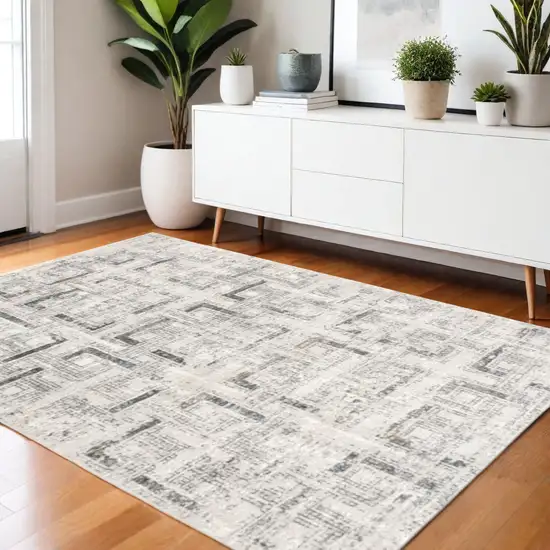 Gray and Ivory Abstract Power Loom Area Rug Photo 1