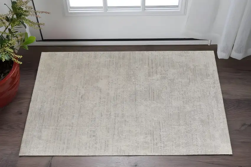 Gray and Ivory Abstract Hand Woven Worn Faded Area Rug Photo 1