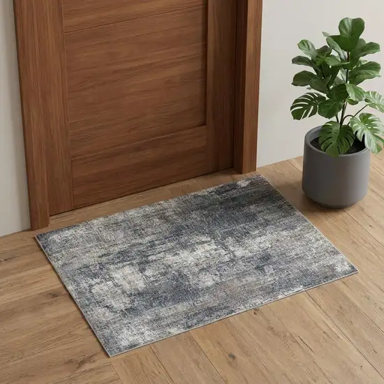 Gray and Ivory Abstract Power Loom Area Rug Photo 1