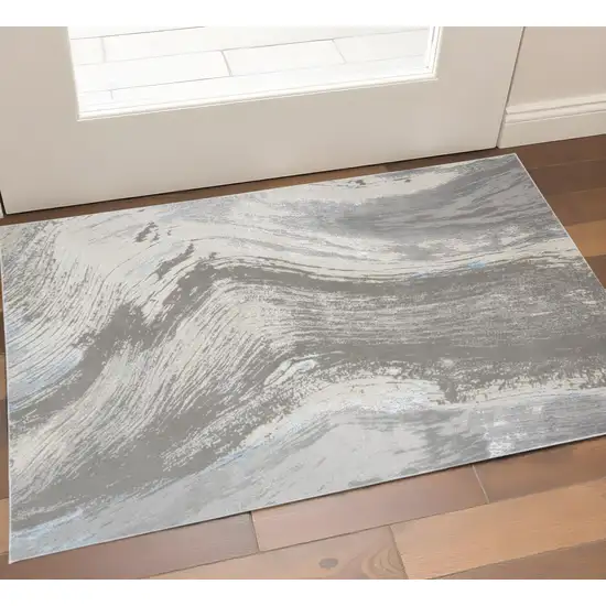 Gray Ivory And Blue Abstract Area Rug Photo 1