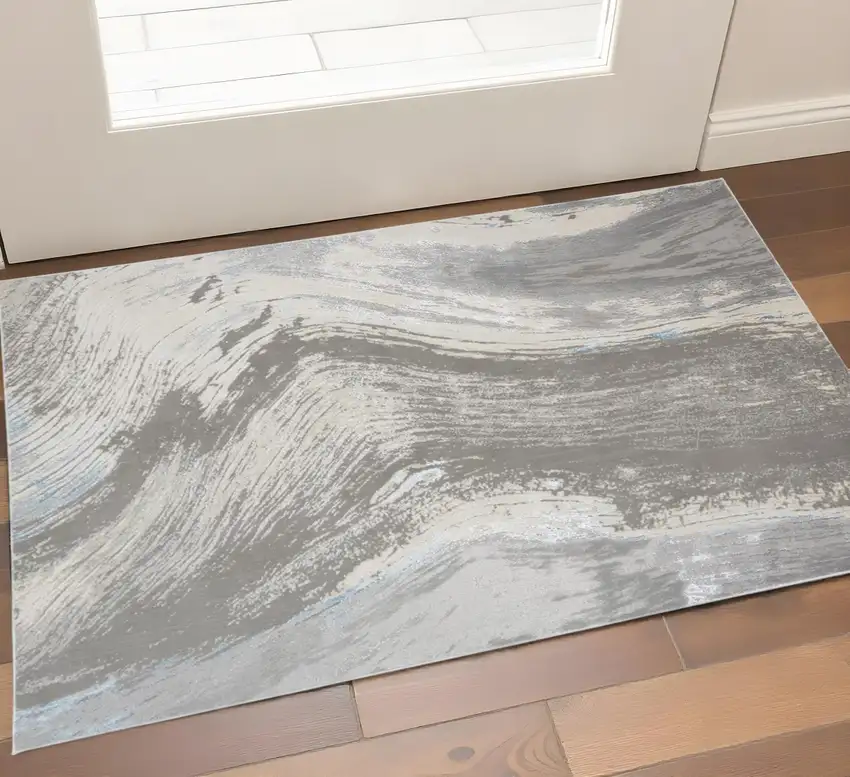 Gray Ivory And Blue Abstract Area Rug Photo 1