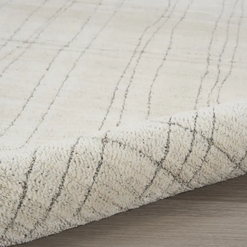 Gray And Ivory Abstract Area Rug Photo 9