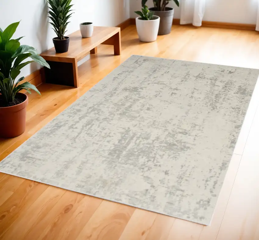 Gray and Ivory Abstract Power Loom Area Rug Photo 1