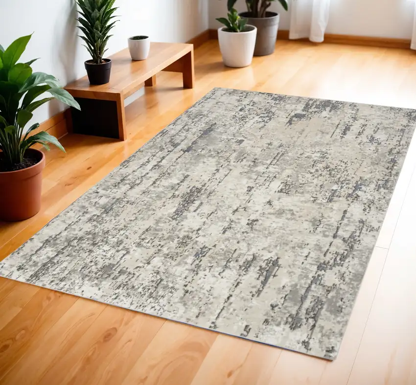 Gray and Ivory Abstract Power Loom Area Rug Photo 1