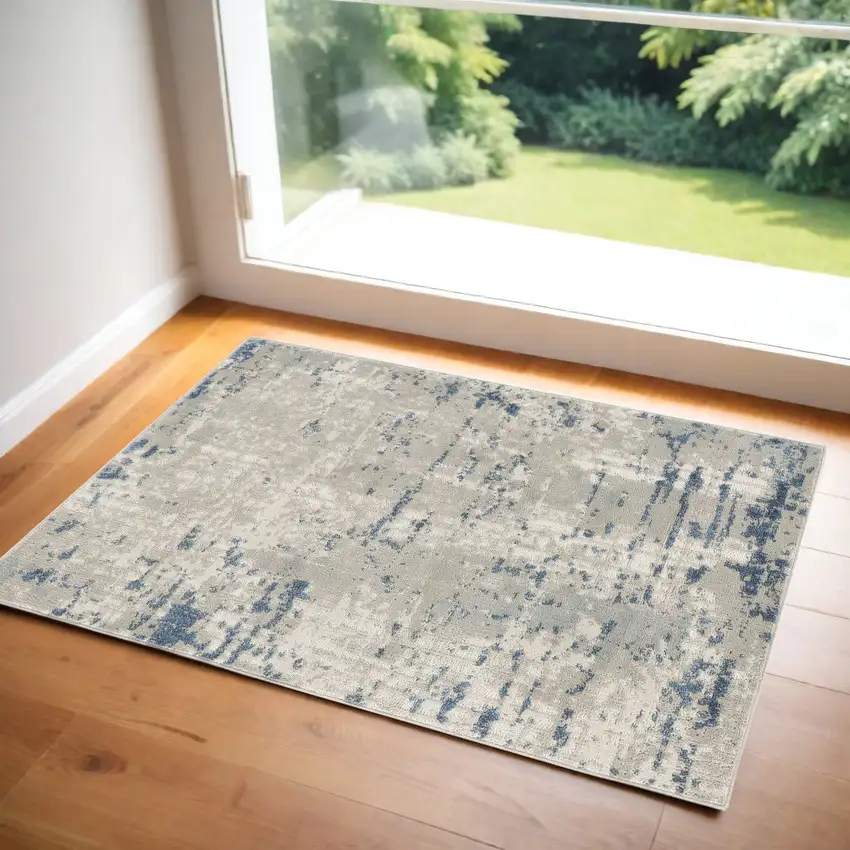 Gray and Ivory Abstract Power Loom Area Rug Photo 1