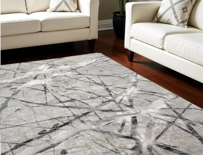 Gray and Ivory Abstract Power Loom Area Rug Photo 1