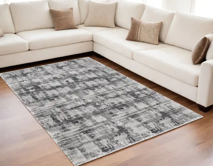 Gray and Ivory Abstract Power Loom Area Rug Photo 1