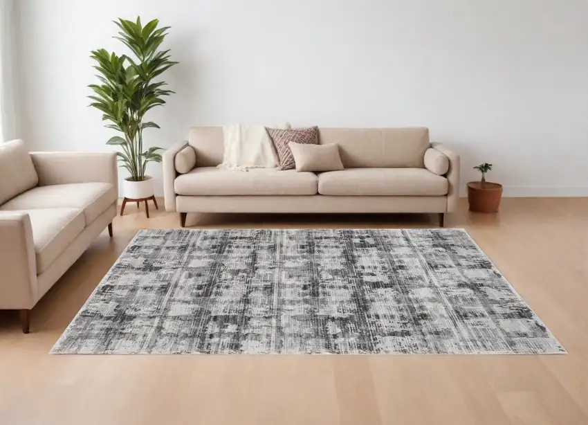 Gray and Ivory Abstract Power Loom Area Rug Photo 1