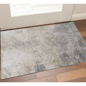 Photo of Gray and Ivory Abstract Power Loom Worn Faded Area Rug