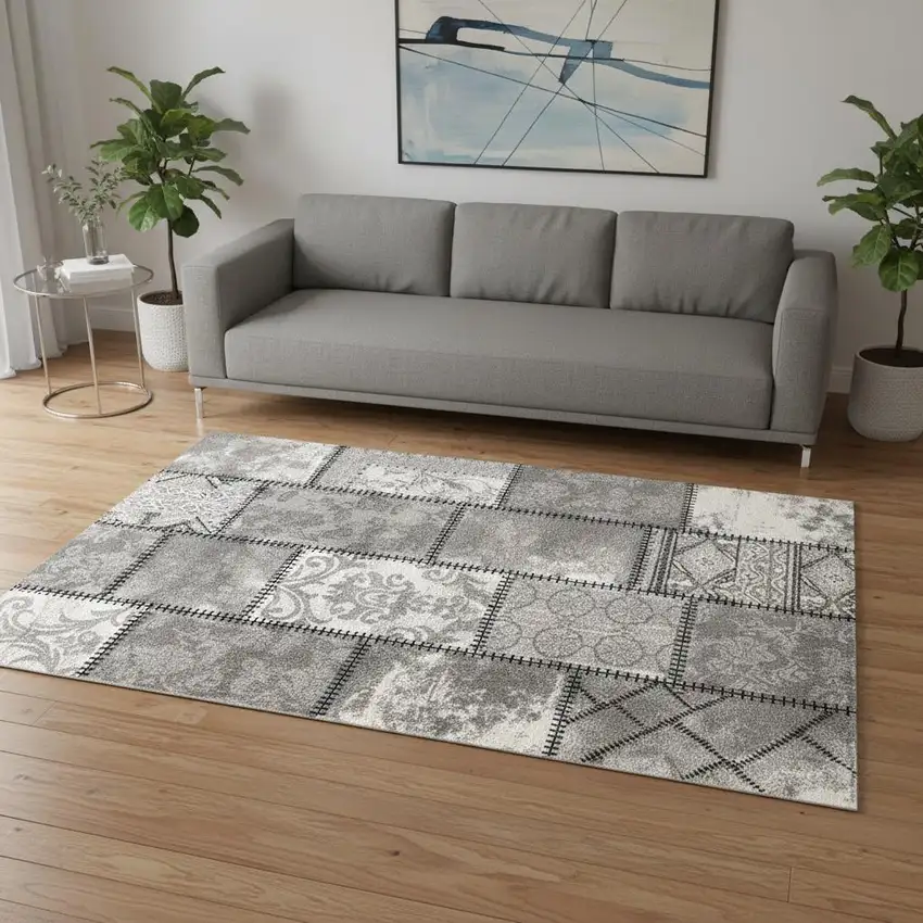 Gray and Ivory Damask Power Loom Area Rug Photo 1