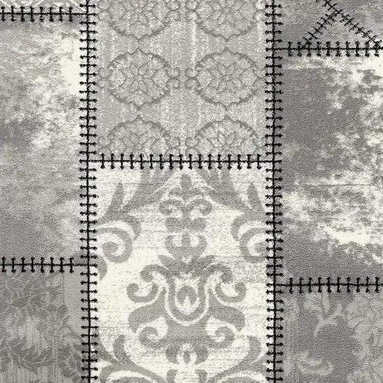 Gray and Ivory Damask Power Loom Area Rug Photo 5