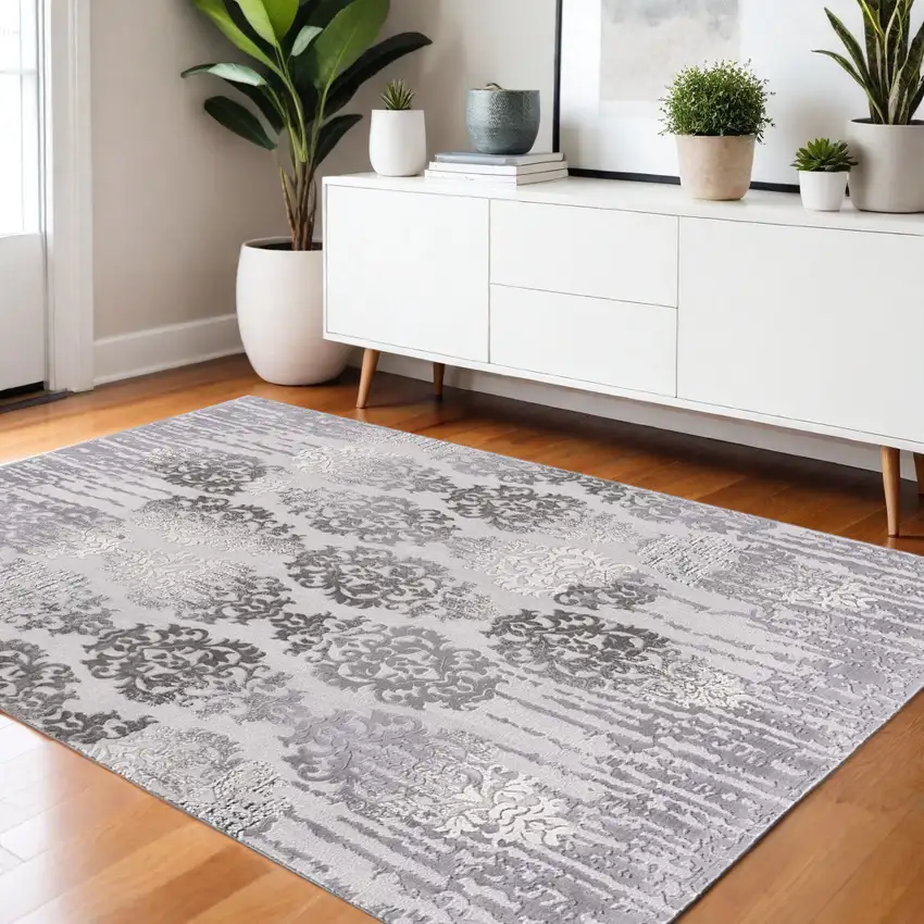 Gray and Ivory Damask Power Loom Area Rug Photo 1