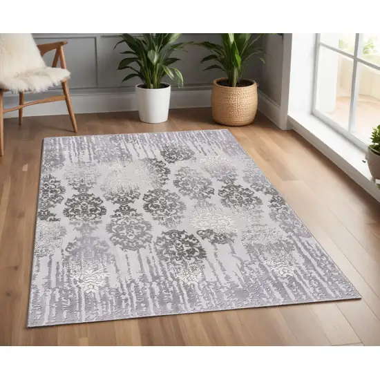 Gray and Ivory Damask Power Loom Area Rug Photo 1
