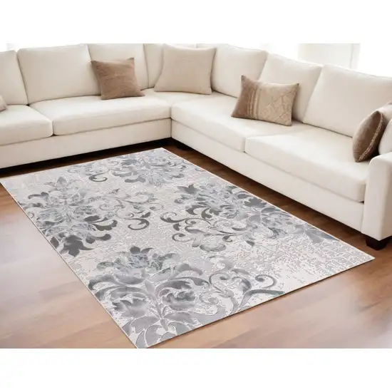Gray and Ivory Damask Power Loom Area Rug Photo 1