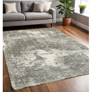 Photo of Gray and Ivory Distressed Abstract Area Rug