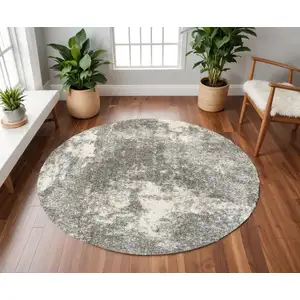 Photo of Gray and Ivory Distressed Abstract Area Rug