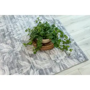 Photo of Gray and Ivory Floral Distressed Area Rug