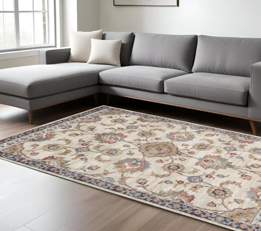 Ivory Navy and Orange Floral Power Loom Area Rug Photo 1