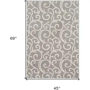 Photo of Gray and Ivory Floral Vines Power Loom Area Rug