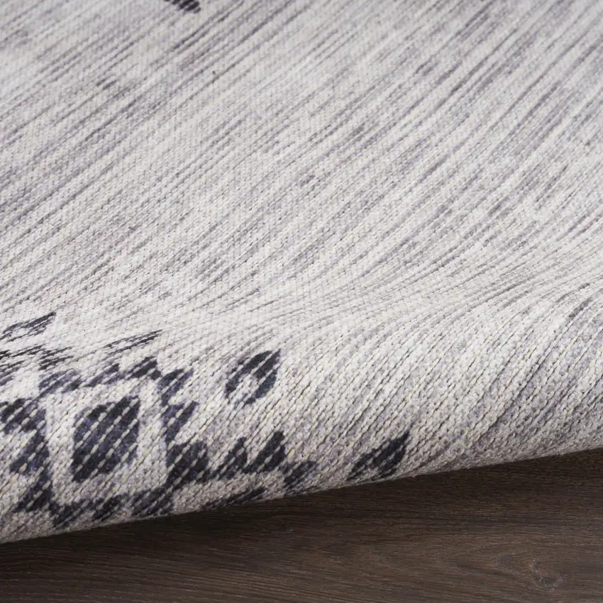 5' X 7' Gray and Ivory Geometric Power Loom Washable Area Rug Photo 9