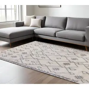 Photo of Gray and Ivory Geometric Shag Area Rug