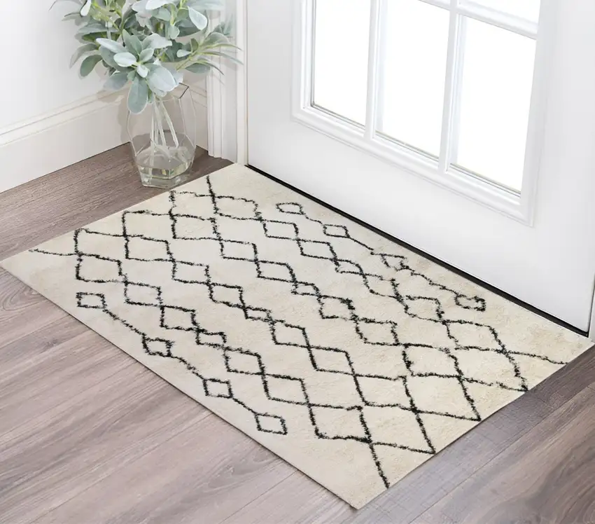 Ivory and Black Geometric Shag Area Rug Photo 1