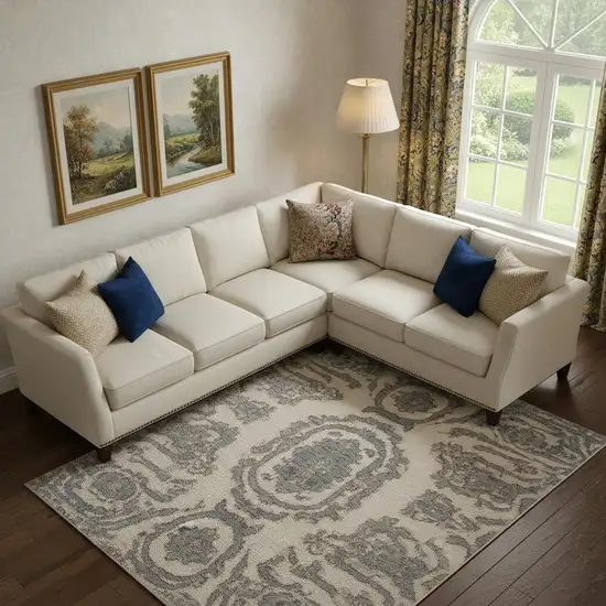 Gray and Ivory Medallion Power Loom Area Rug Photo 1