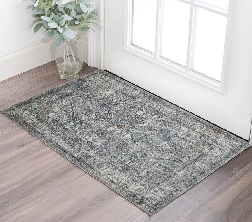 Ivory Navy and Orange Oriental Power Loom Area Rug Photo 1