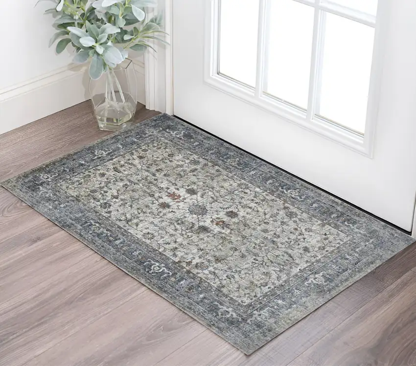 Ivory Blue and Gray Oriental Power Loom Area Rug Photo 1