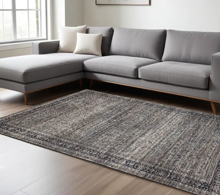 Gray and Ivory Oriental Power Loom Distressed Washable Area Rug Photo 1