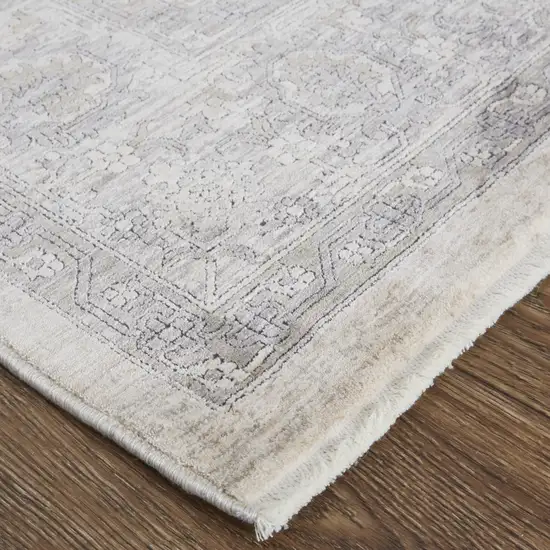 Gray and Ivory Oriental Power Loom Worn Faded Area Rug With Fringe Photo 9
