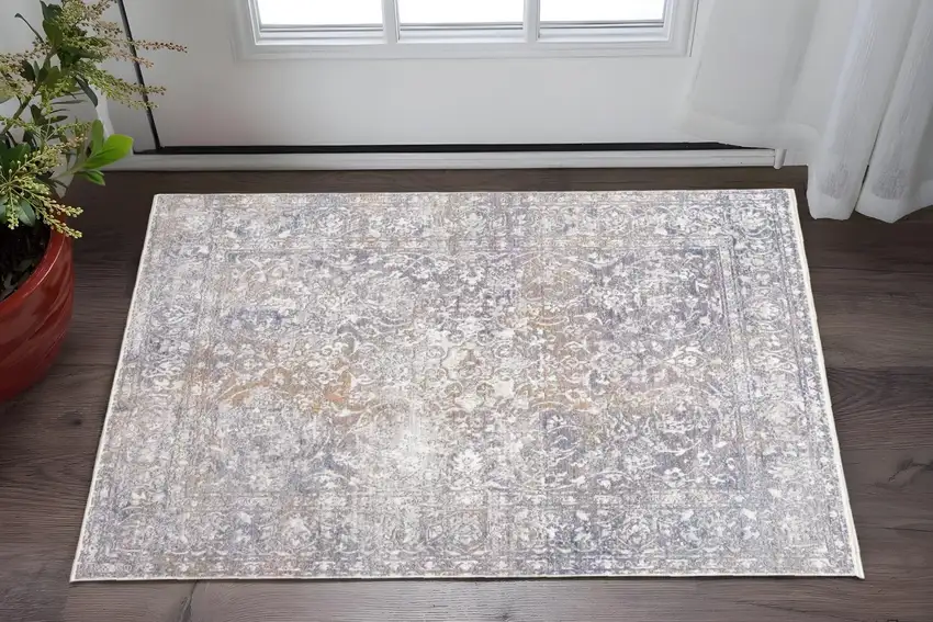 Gray and Orange Abstract Power Loom Worn Faded Area Rug With Fringe Photo 1