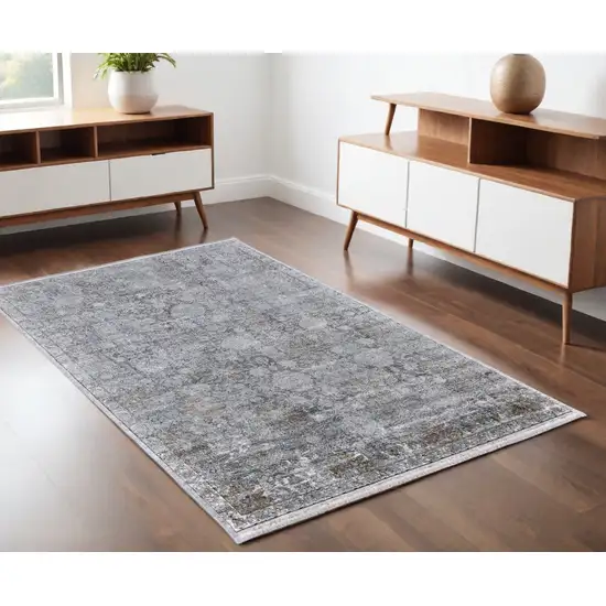 Gray and Silver Damask Power Loom Worn Faded Area Rug Photo 1