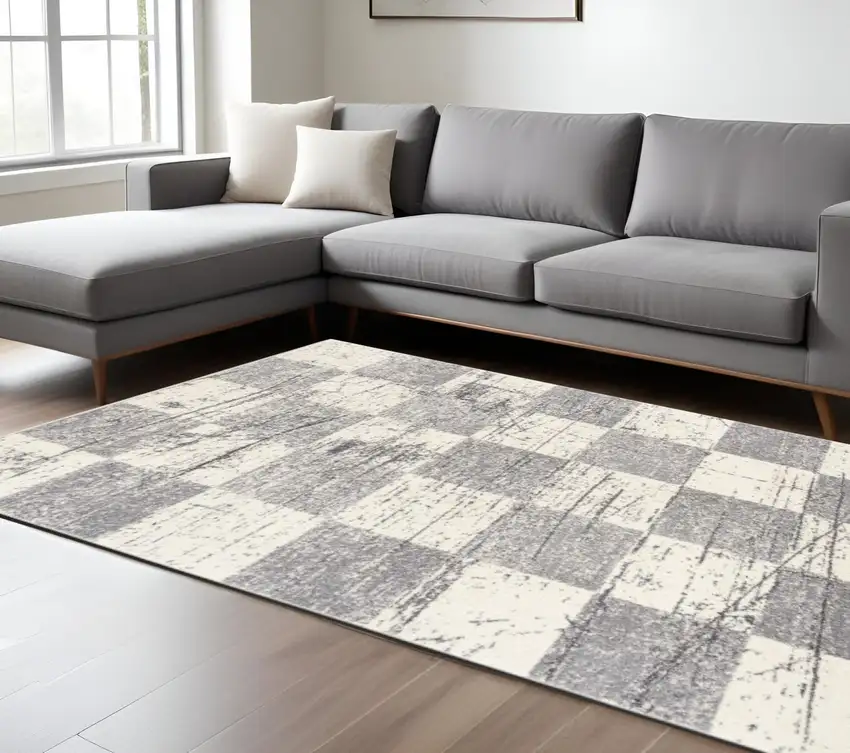 Gray and White Checkered Power Loom Distressed Area Rug Photo 1