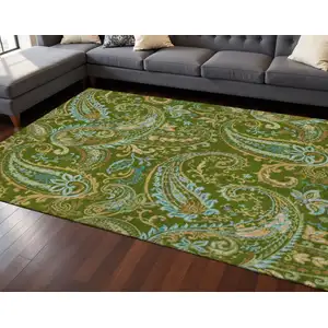 Photo of Green And Blue Paisley Washable Area Rug With UV Protection