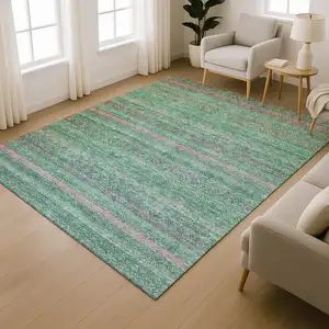 Photo of Green And Blush Striped Washable Area Rug With UV Protection
